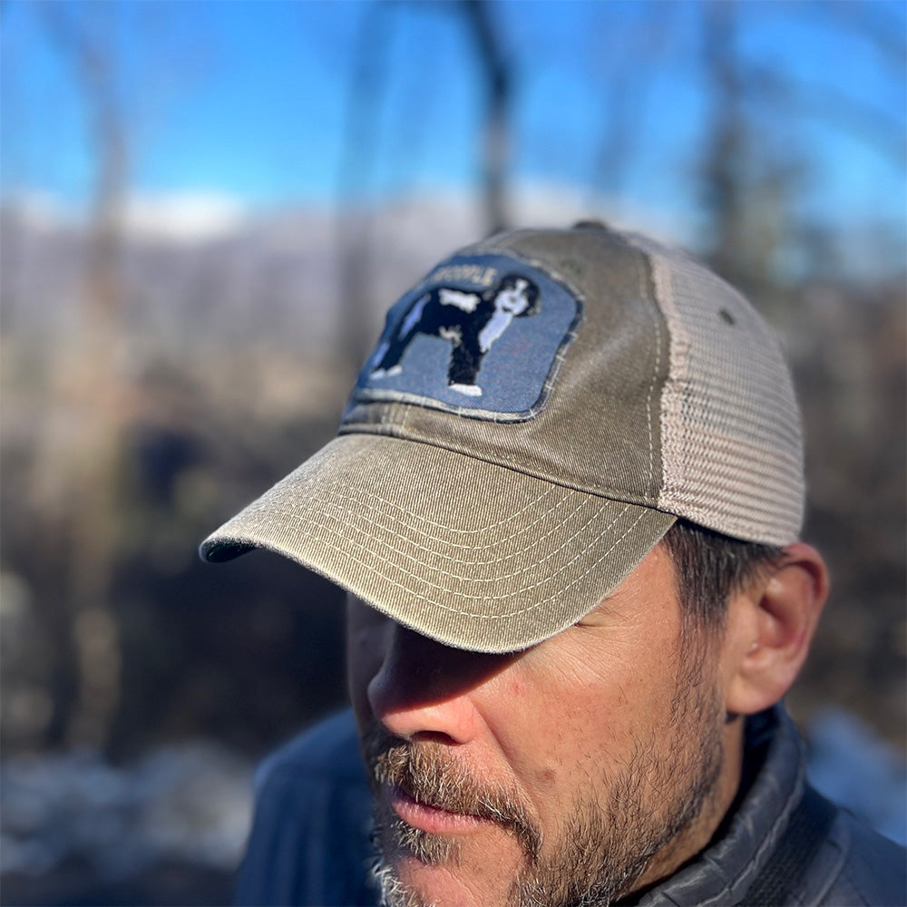 Man wearing Bernedoodle Trucker Hat